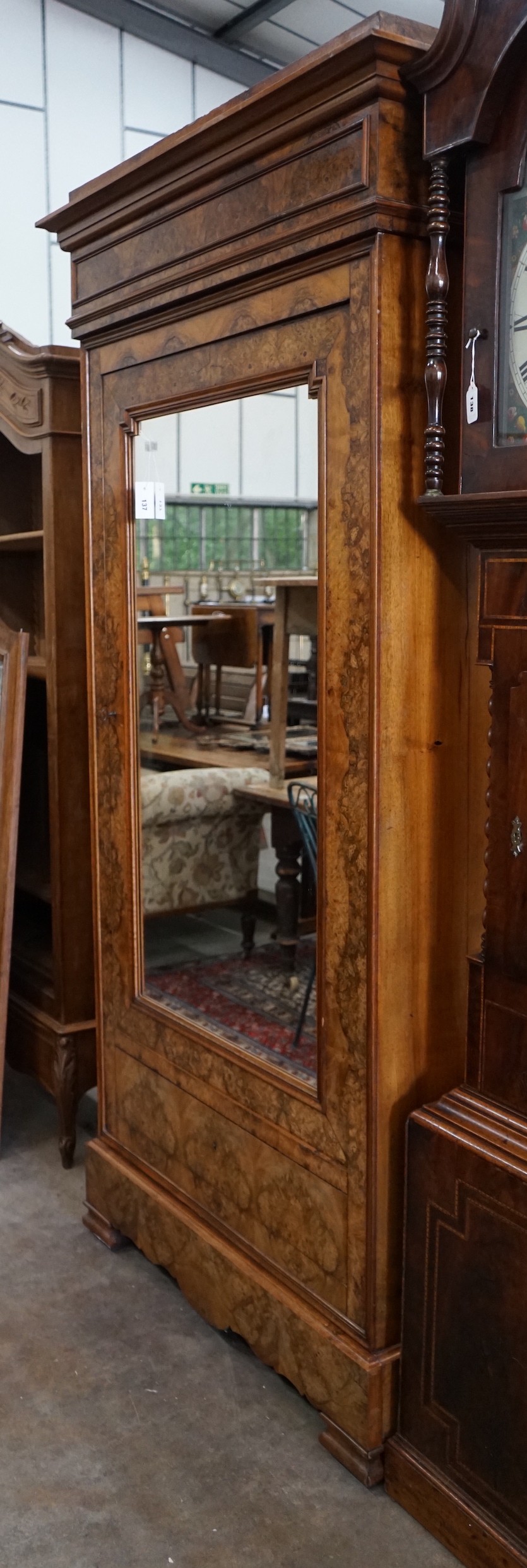 A 19th century French burr walnut mirrored armoire, width 116cm, depth 54cm, height 224cm